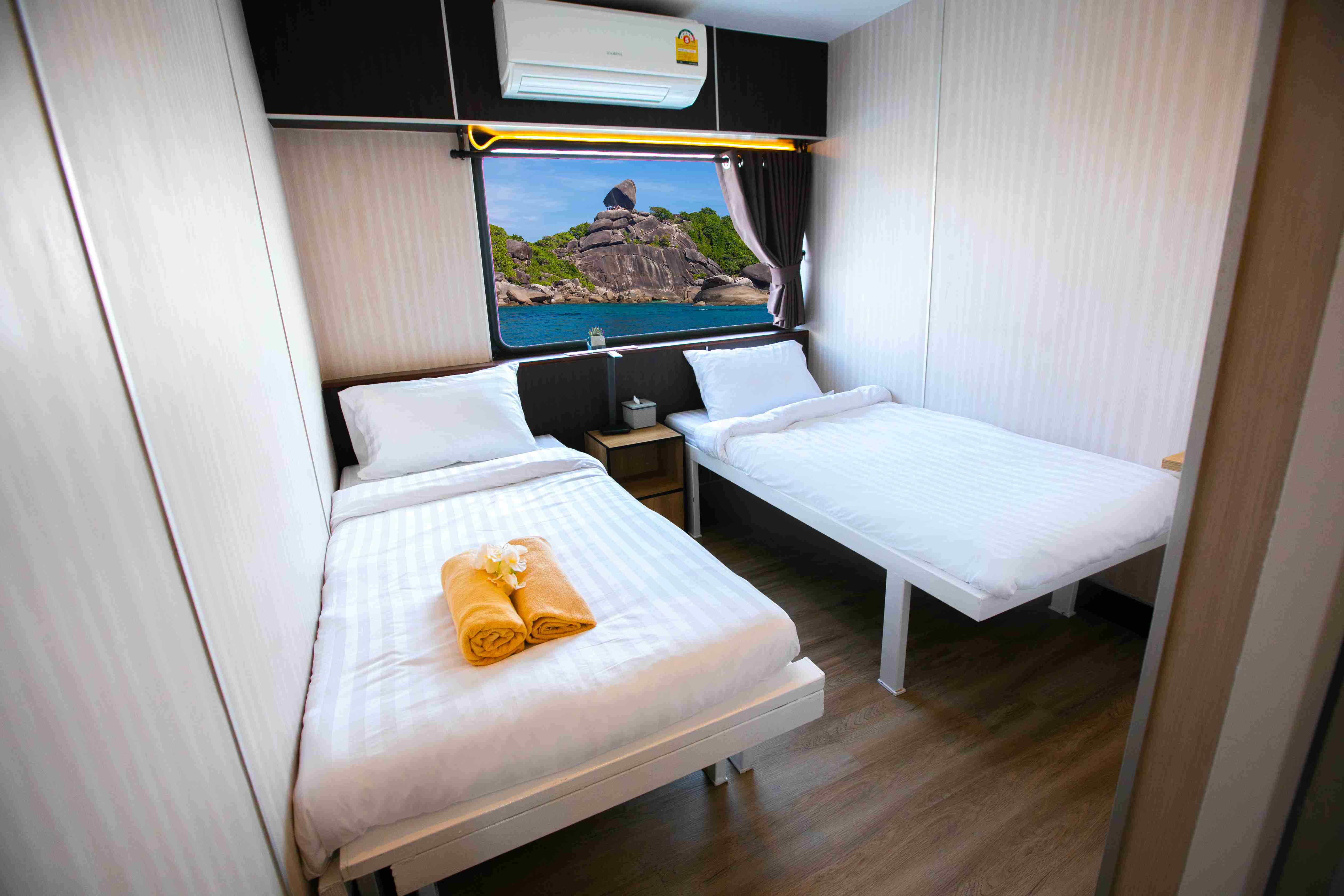 Air-conditioned twin cabin on MV Koon 9